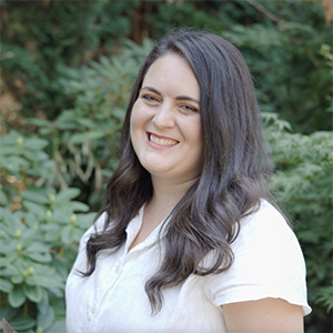 Portrait of Marian Schembari smiling outdoors